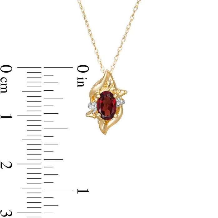 Goldia Necklaces Oval LabCreated Garnet and Diamond Accent Flame Burst Pendant in 10K Yellow Gold Goldia Necklaces Oval LabCreated Garnet and Diamond Accent Flame Burst Pendant in 10K Yellow Gold