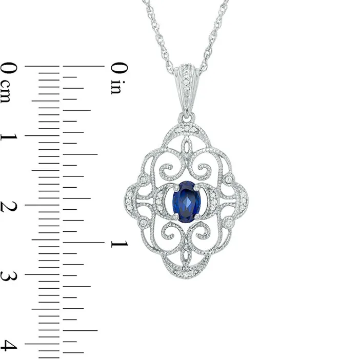 Necklaces Goldia Oval LabCreated Blue Sapphire and Diamond Accent Antique VintageStyle Scroll Pendant in Sterling Silver Necklaces Goldia Oval LabCreated Blue Sapphire and Diamond Accent Antique VintageStyle Scroll Pendant in Sterling Silver